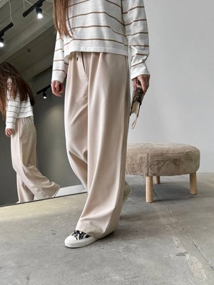 Жіночі брюки з декоративним шнурком колір бежевий р.42 451519 451526 фото