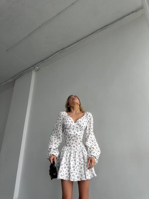 Жіночий комбінезон із шортами-спідницею колір білий р.46/48 454067 454059 фото